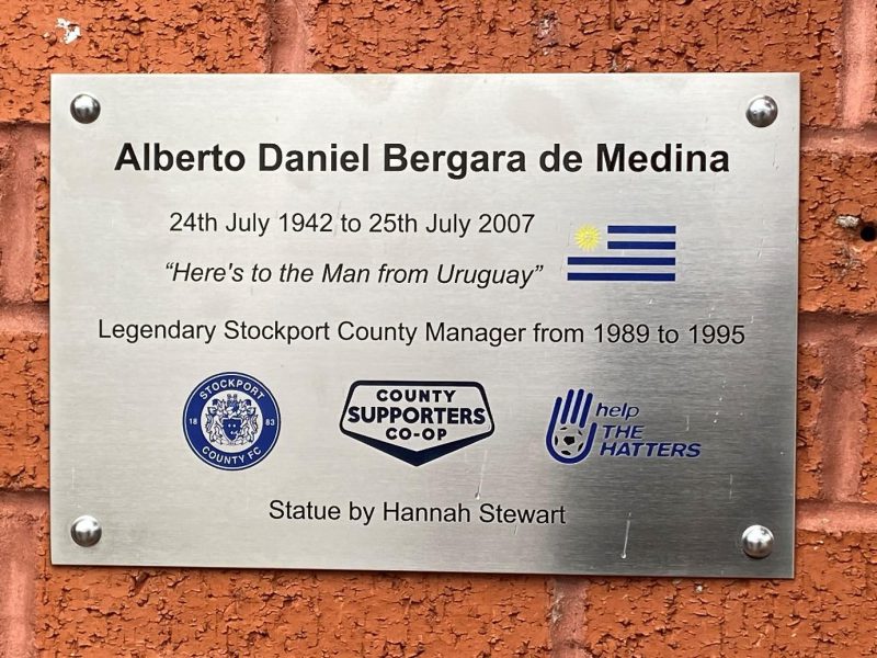 A photo of the plaque outside Edgeley Park that commemorates the life of Danny Bergara and the statue by Hannah Stewart.